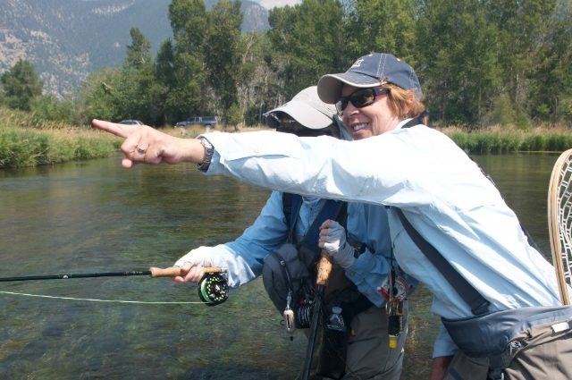 An MCI instructor teaching a student on the water.